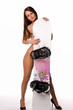 beautiful nude woman covering her body with a snowboard