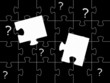Fragezeichen und Puzzle