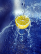 Water splashing on lemon
