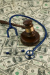 Dollar Bills and gavel Dollar Bills and gavel