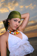 Portrait of beautiful fashion model at sunset