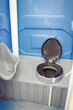 A commode in a camping toilet.