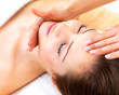 Female Hands Giving Face Massage