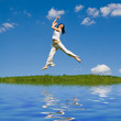 jumping girl in meadow