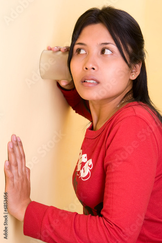 Photo: Listening using glass Listening using glass