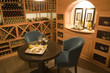 Wine cellar with seating for two. Wine cellar with seating for two.