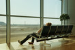 Lonely girl waiting in airport Lonely girl waiting in airport