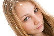 The young beautiful girl with confetti isolated on a white