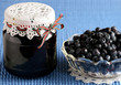 Food,black currant jam in jar and fresh black currants in bowl Food,black currant jam in jar and fresh black currants in bowl