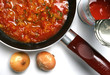 Food,tomato sauce with onion in baking pan Food,tomato sauce with onion in baking pan