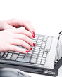 Photo: Frau hält Finger über Notebook Frau hält Finger über Notebook