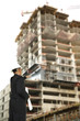 Designer Pointing At Construction Building Designer Pointing At Construction Building