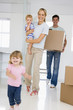 Young Family Moving Into New Home
