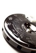 A circle pitch pipe on white background.