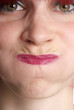 woman holds breath
