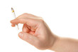 Human hand holding cigarette