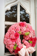 an image of church doors with Wedding flowers on it