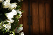 flower with the church doors before a wedding