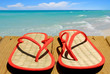 Straw Flip Flops on Beach Pier Straw Flip Flops on Beach Pier
