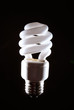 Cfl fluorescent lightbulb on dark background