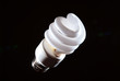 Cfl fluorescent lightbulb on dark background