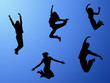 jumping people on blue sky