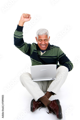 Photo: Senior Man On Laptop Senior Man On Laptop