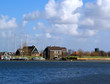 Dutch village view with private yachts moored on front