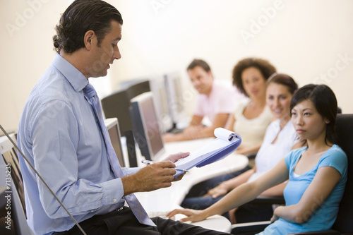 Photo: Manager briefing office staff Manager briefing office staff