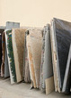 Colorful granite slabs for sale in store yard