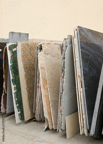 Photo: Colorful granite slabs for sale in store yard Colorful granite slabs for sale in store yard