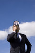 Businessman speaking with a megaphone