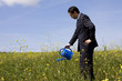 businessman with a flowerpot