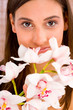 Close up of a pretty woman with flowers Close up of a pretty woman with flowers