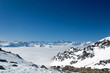 mountain peaks above the clouds.