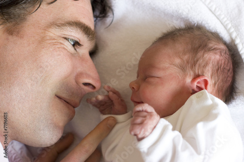 Photo: father and his newborn daughter, a couple of hours old father and his newborn daughter, a couple of hours old