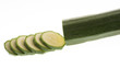 sliced zucchini on white background