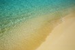 Blue water ripples near the shore