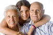 granddaughter embracing her grandparents