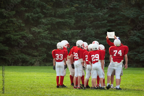 Photo: Going over the play Going over the play