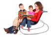 mother reads book with children sit on chair