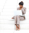 Beautiful Business woman sitting on steps