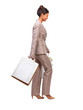 Business woman walking with shopping bags
