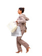 Business woman running with shopping bags