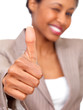 Business woman giving approval with thumbs up.