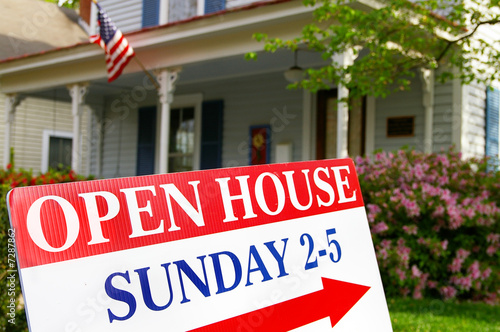 Photo: Open House sign if front of house for sale Open House sign if front of house for sale