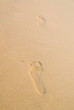 two footprints at Patong beach, Phuket, Thailand two footprints at Patong beach, Phuket, Thailand