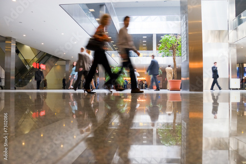 Walking people in modern business center