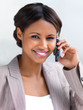 Smiling businesswoman using cellphone