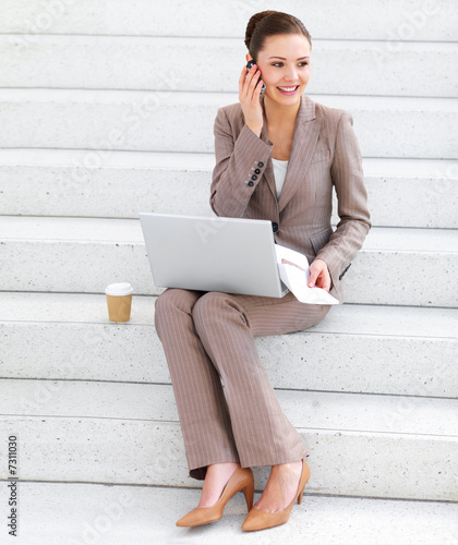 Foto: Smiling young business woman Smiling young business woman